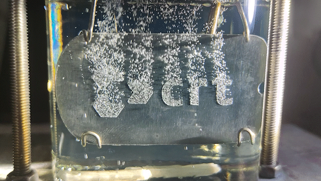 Dehydrogenation of LOHC with a laserstructured and platinum sputtered aluminiumplate showing the CRT logo